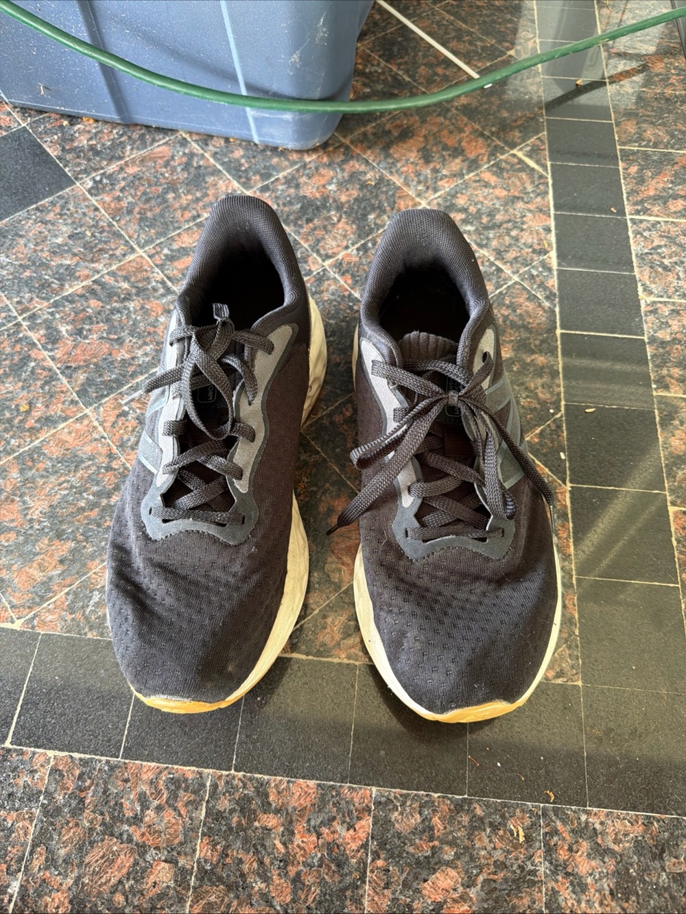 New Balance Black Athletic Running Shoes with White Soles